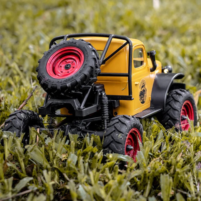 FMS 1/24 FCX24 Power Wagon RTR crawling in the grass