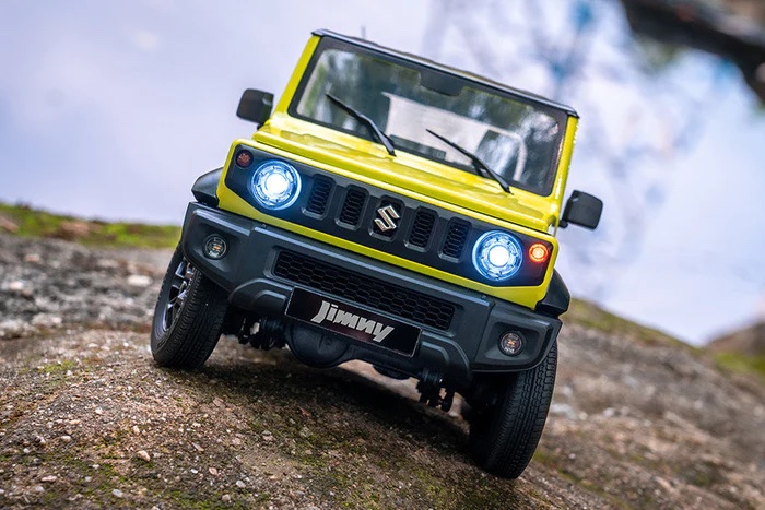 FMS 1 12 Suzuki Jimny RTR Green Front Lights Outdoors.jpg